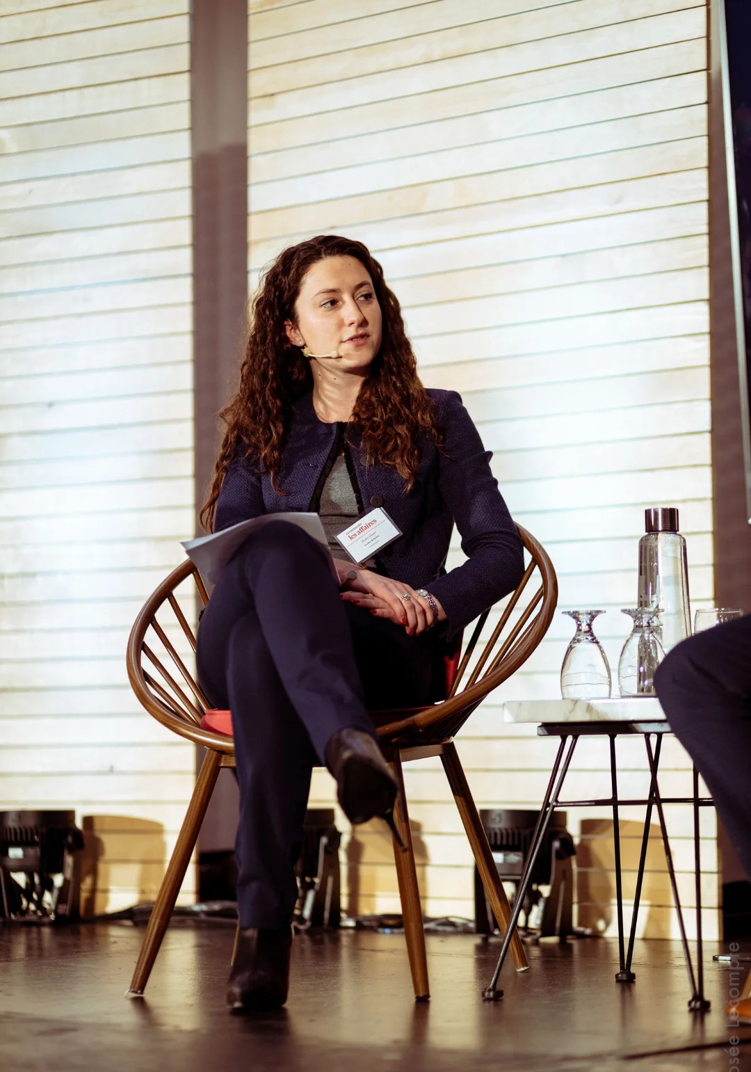 Speaker on stage at an industry conference